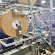 Aplicador de multiempaques maximiza producción de latas de fabricante de bebidas mezcladas