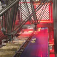Los robots JLS Talon colocan en bandejas tacos frescos que antes estaban demasiado calientes para ser manipulados de manera manual.