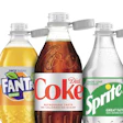 Tapas unidas a la botella Coca - Cola