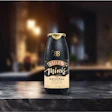 Detrás de la última botella de papel de Baileys.