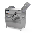 Porcionadora de carne TVI GMS 400 de MULTIVAC, ideal para cortes precisos y formados en 3D de productos cárnicos.