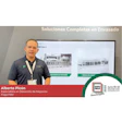 Business professional presenting packaging equipment solutions at Expo Pack conference