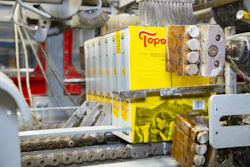 Mediante la implementación de EcoStitch de Valco Melton, Topo Chico redujo el 55 % de adhesivo en el pegado hot melt de cajas con botellas de agua.