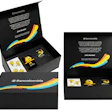 Bancolombia branded luxury gift box set with black packaging, colorful gradient wave design, and promotional merchandise items
