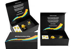 Bancolombia branded luxury gift box set with black packaging, colorful gradient wave design, and promotional merchandise items