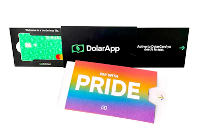 DolarApp digital payment service promotion featuring a green debit card and rainbow Pride-themed payment card with borderless banking messaging