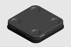 Dark gray wireless charging pad with rounded corners and four rubber feet