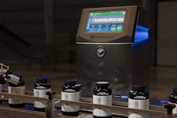 VideoJet industrial inkjet printer with display screen and ink bottles arranged on conveyor line