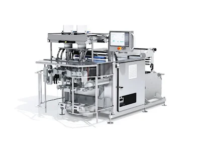 Industrial automated packaging or manufacturing machine with control panel and mechanical components
