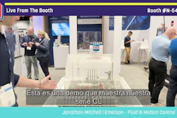 Live demonstration at Pack Expo booth N-5449 showing industrial equipment with visitors and staff engaged in discussion