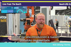 Nick DeLong from Formic speaking at Pack Expo booth N-5447, discussing pallet solutions with industrial machinery visible in background
