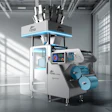 tna Quantum medical or laboratory device with blue accents displayed in modern industrial facility